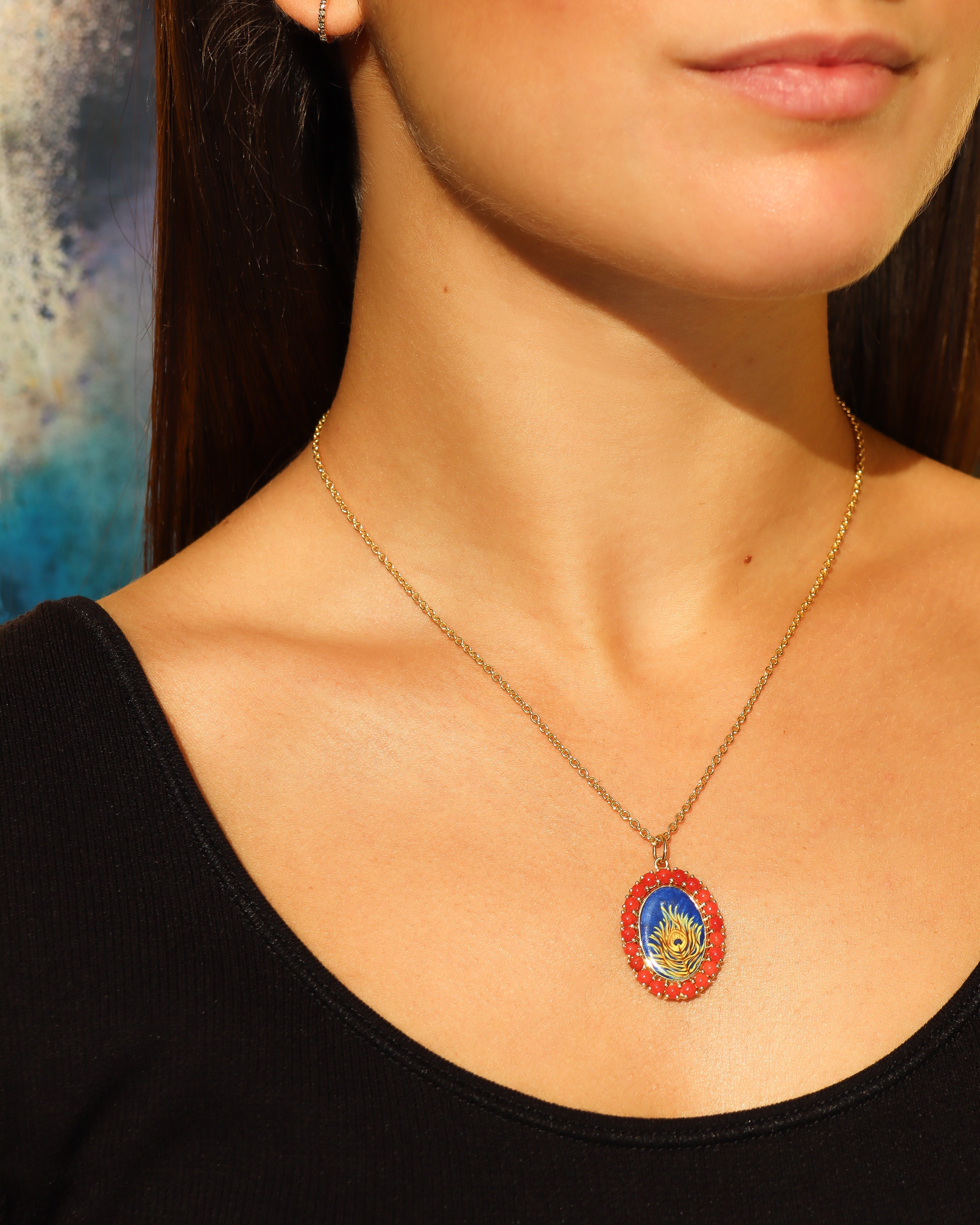 Ciondolo Piuma di Pavone con Corallo Rosso