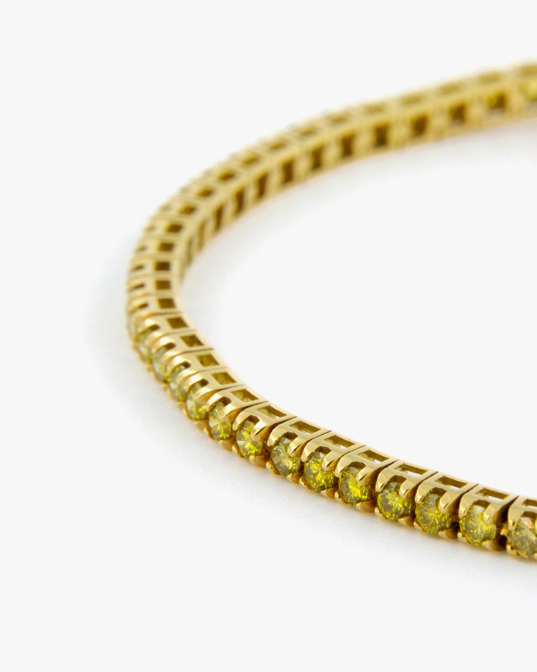 Bracciale tennis in oro giallo 18K con diamanti gialli fancy firmato Merù Gioielli