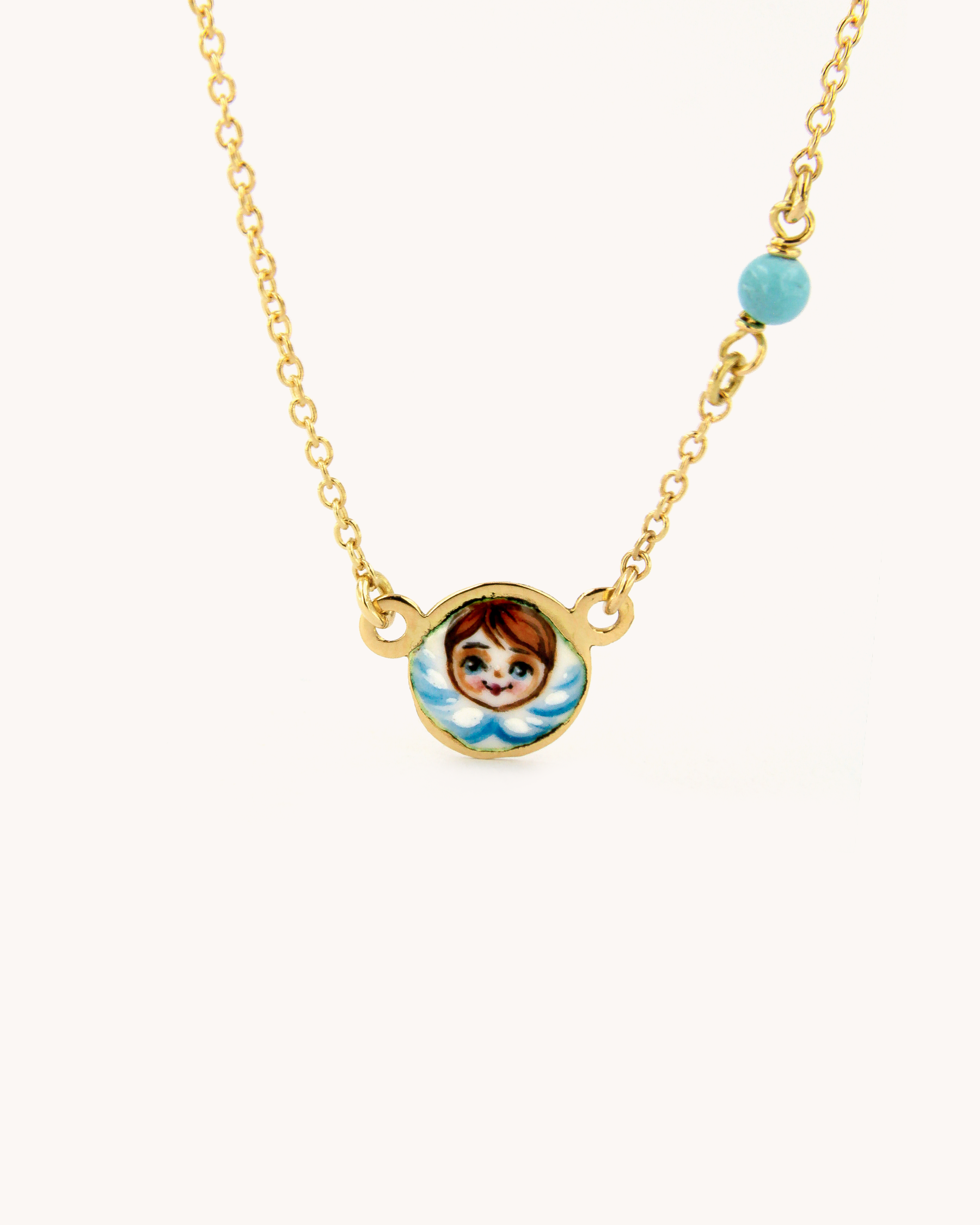 Collana Angelo Blu in oro giallo 18 carati con smalto a fuoco e perlina in pasta di turchese
