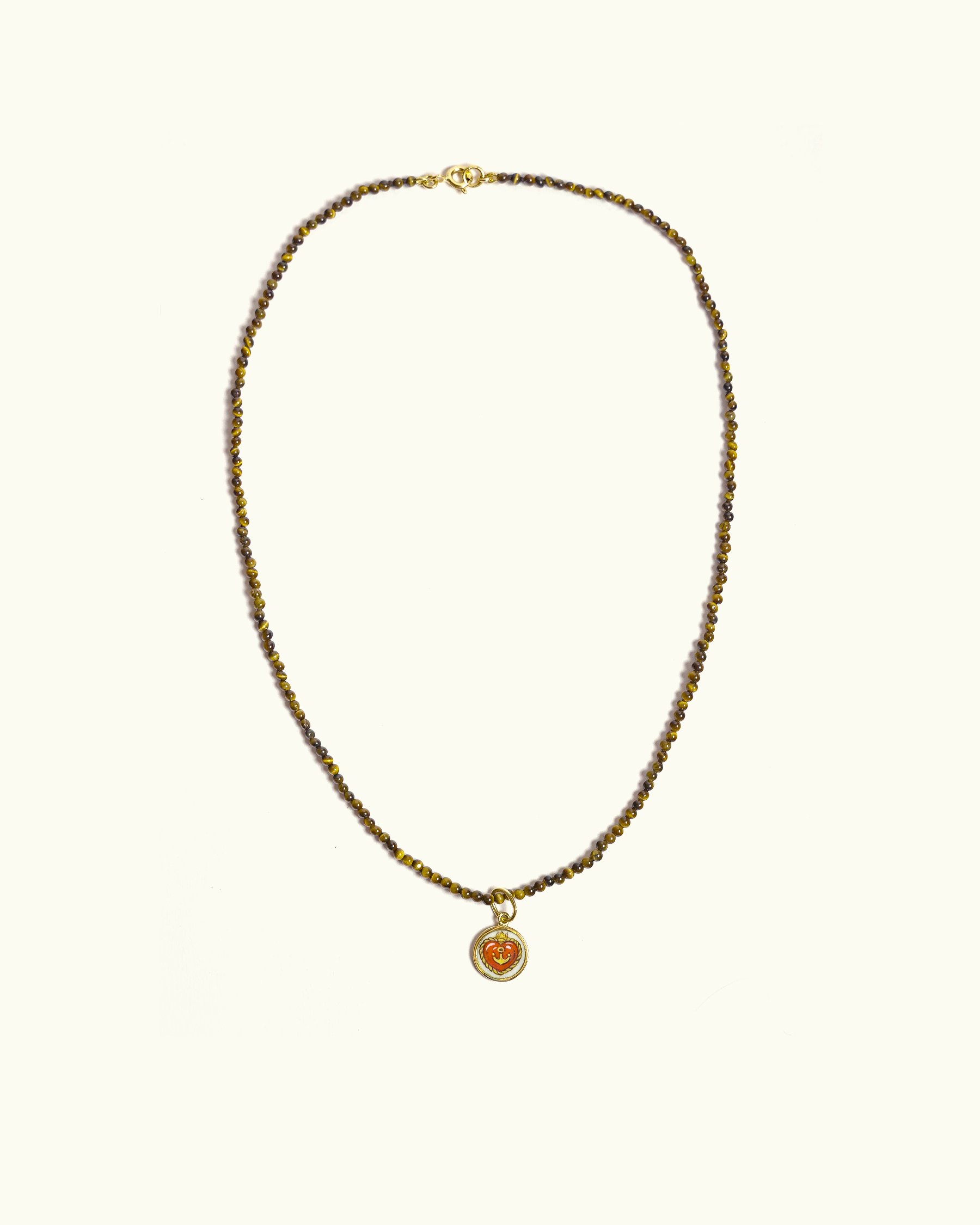 Collana Coloris in occhio di tigre con piastra in oro giallo 18K e cuore dipinto a mano in smalto a fuoco