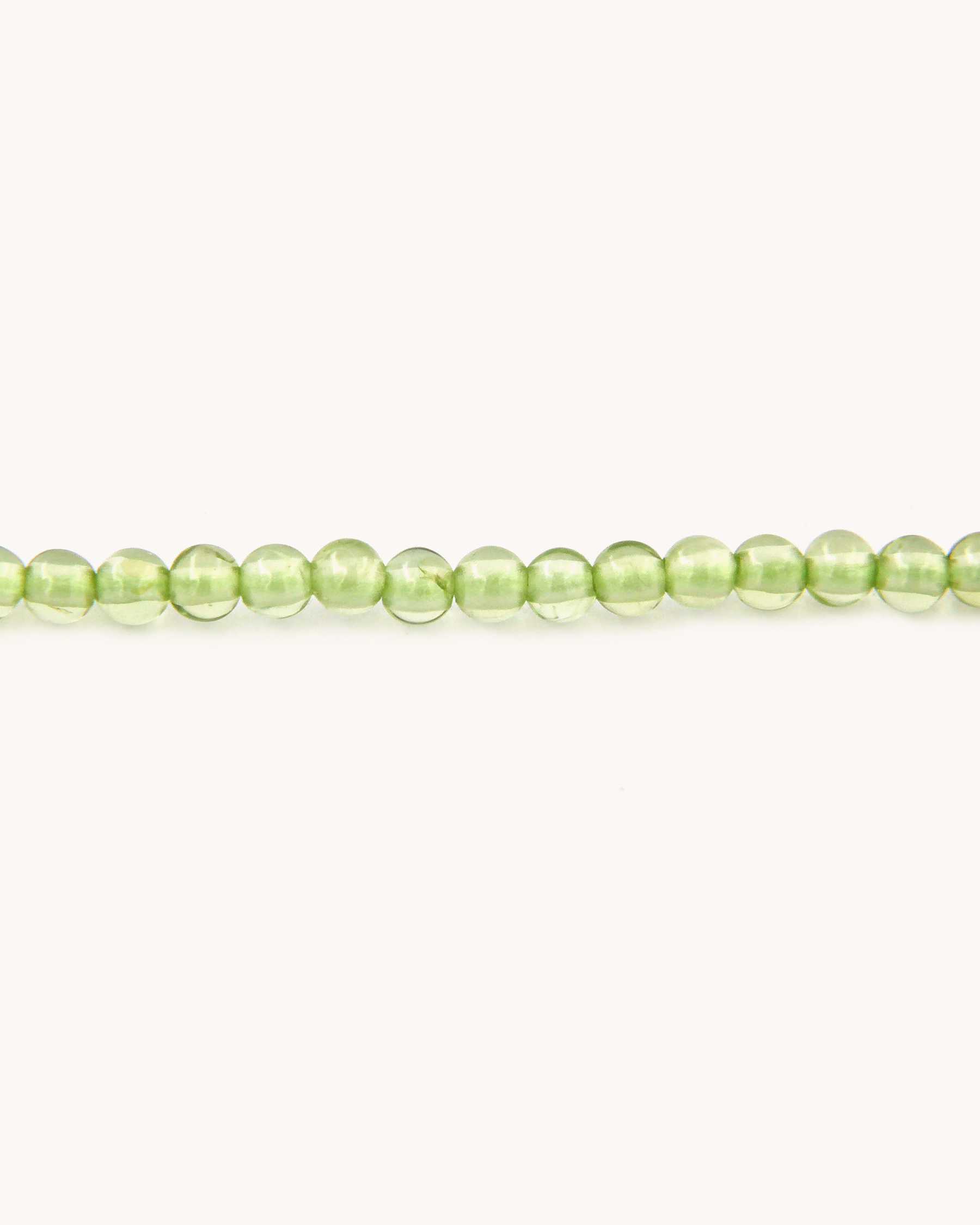 Collana Coloris Sirena Caudata con perline di peridoto e piastra in oro giallo 18K dipinta a mano in smalto a fuoco