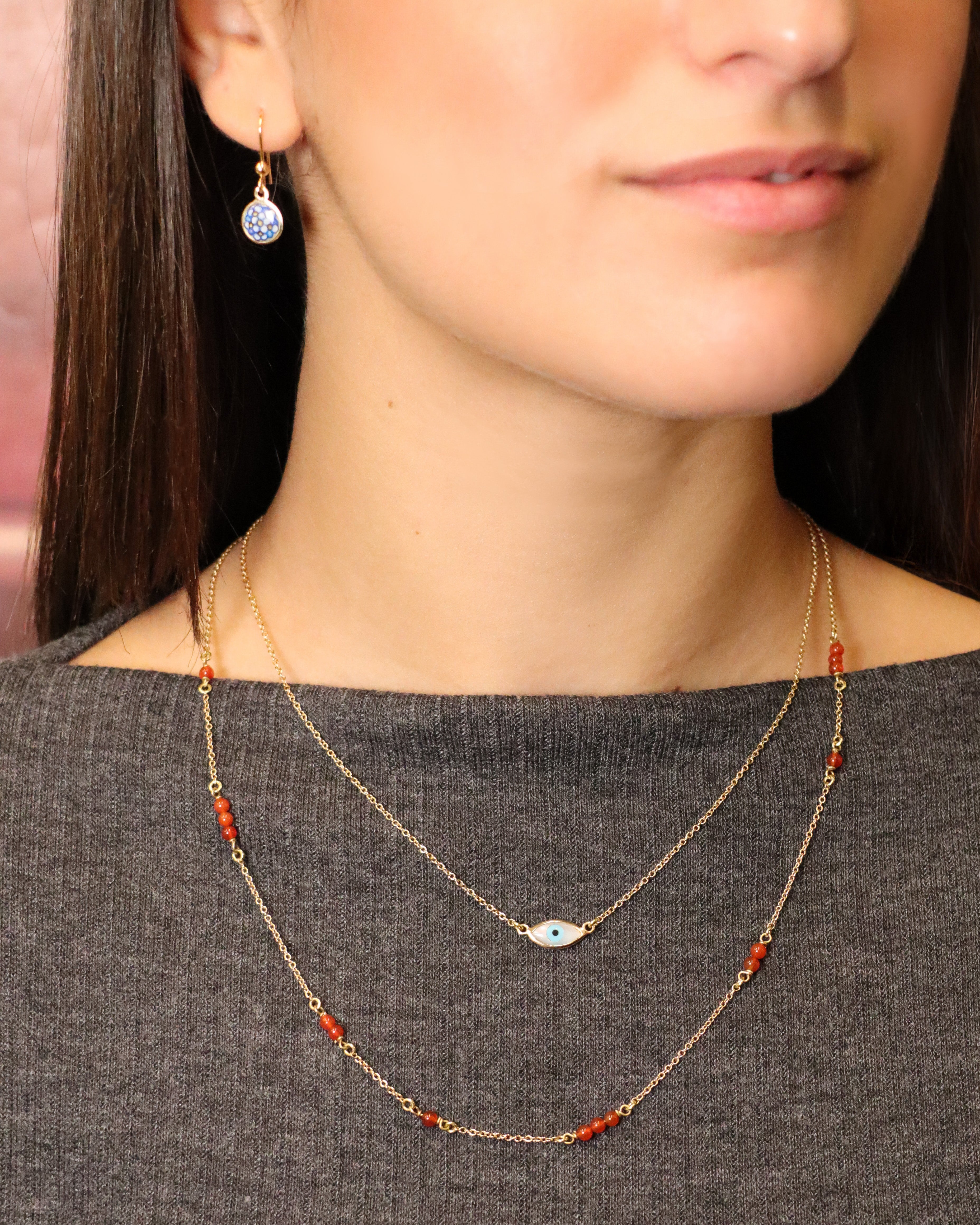 Collana in oro giallo 18 carati con perline di corniola