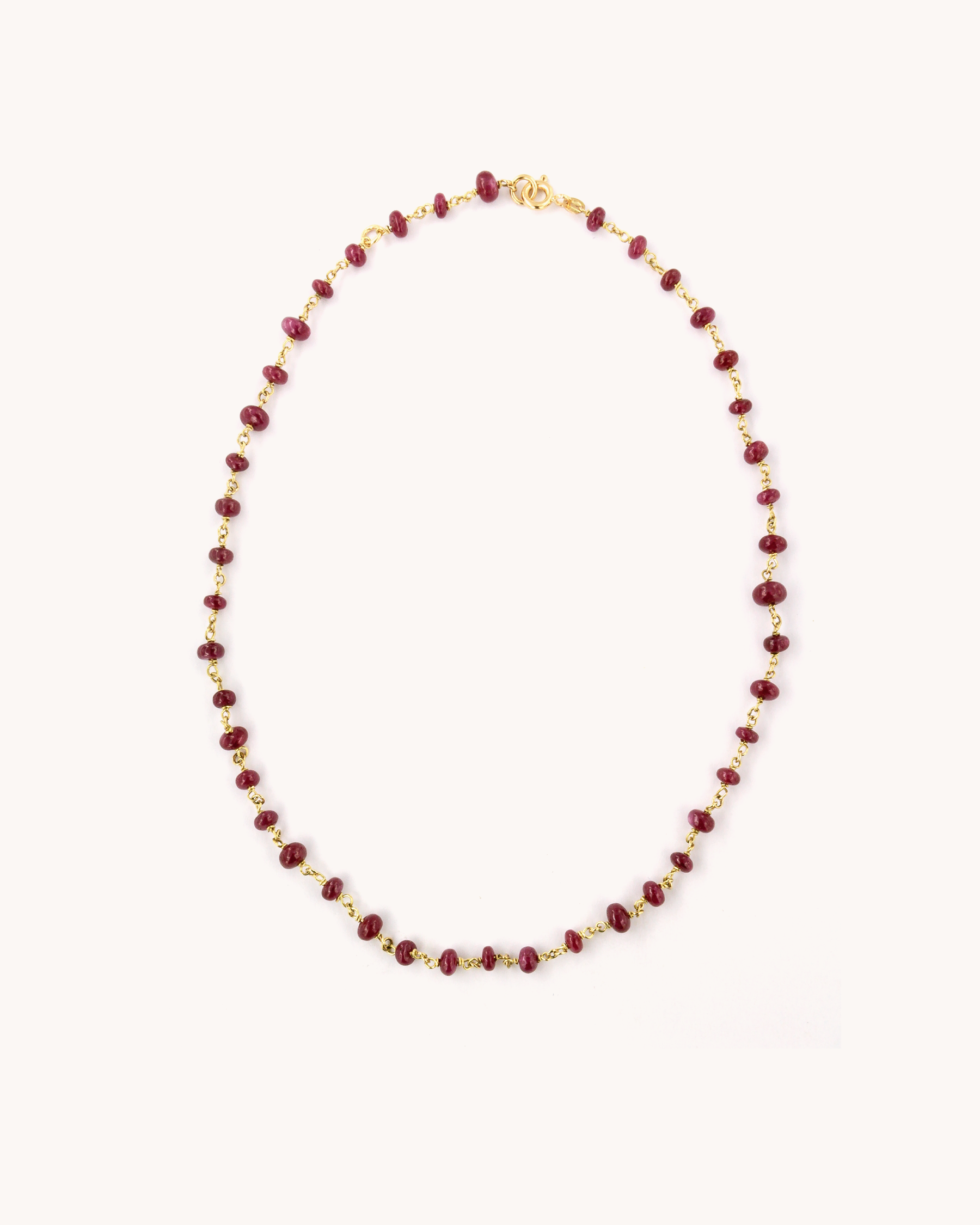 Collana Mediterraneo in oro 18 carati con radici di rubini disposte in sequenza mista