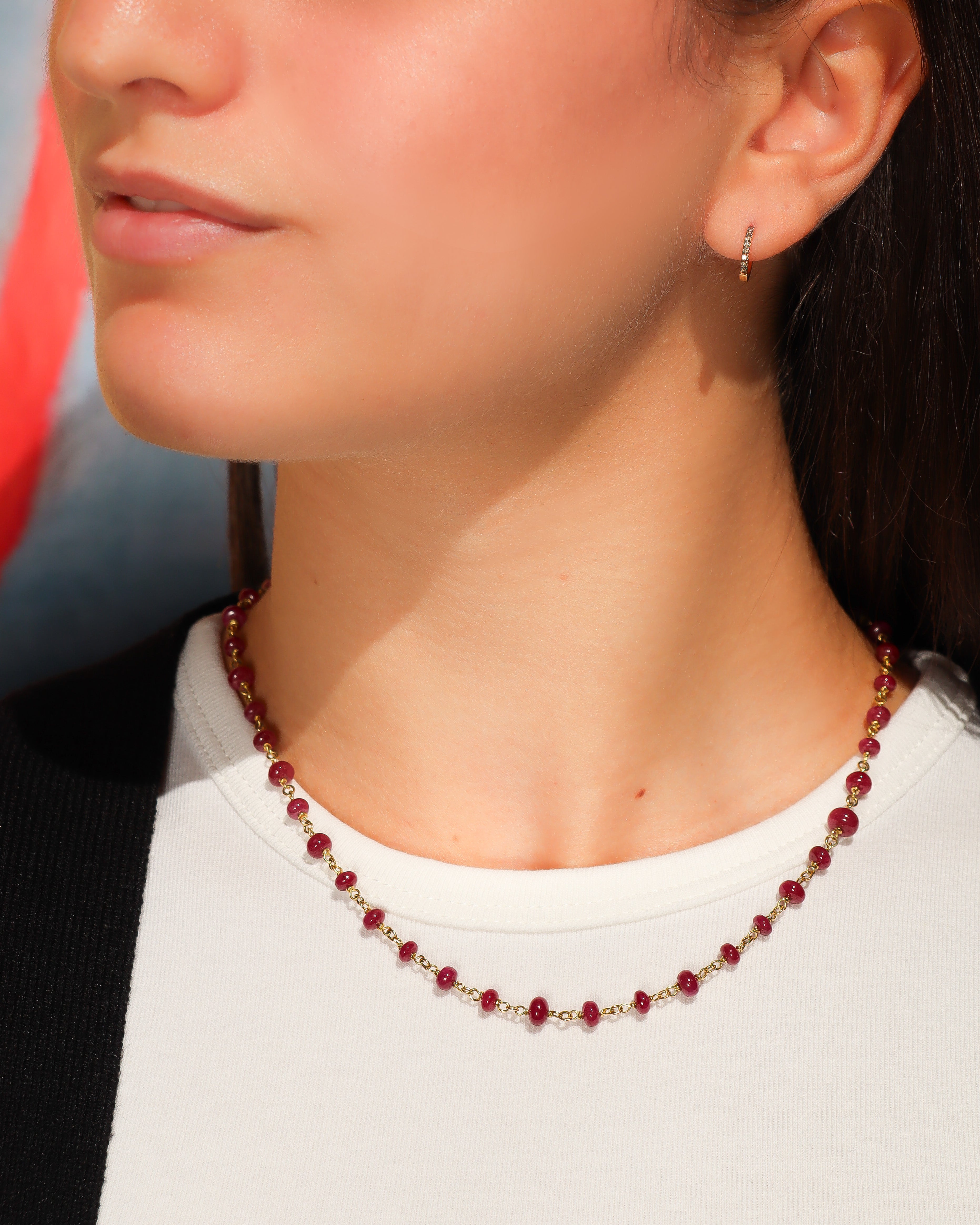 Collana Mediterraneo in oro 18 carati con radici di rubini disposte in sequenza mista