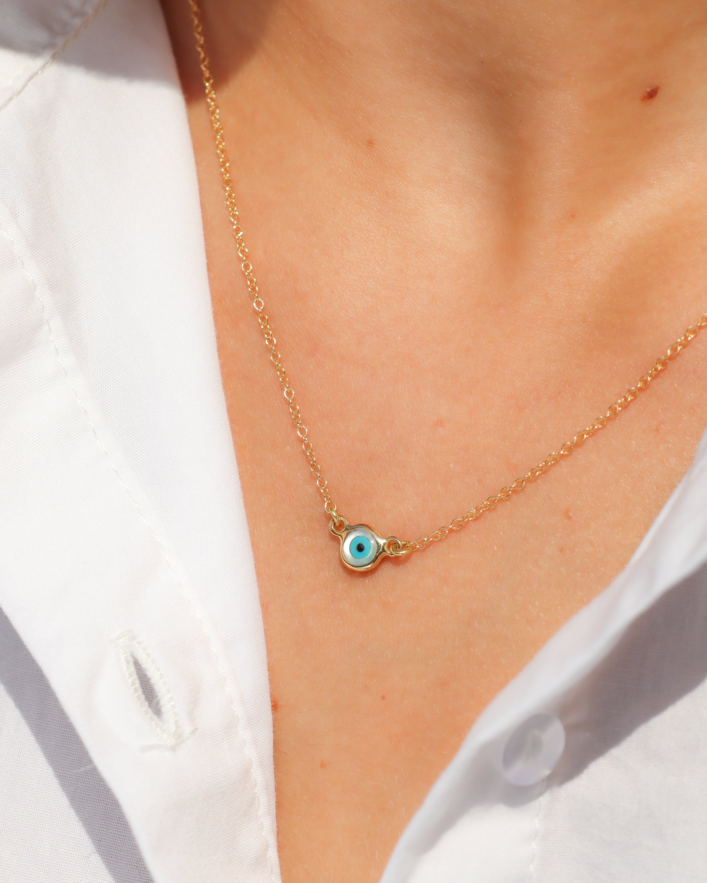 Collana in oro giallo 18 carati con pendente Occhio della Fortuna piccolo in madreperla, turchese e onice