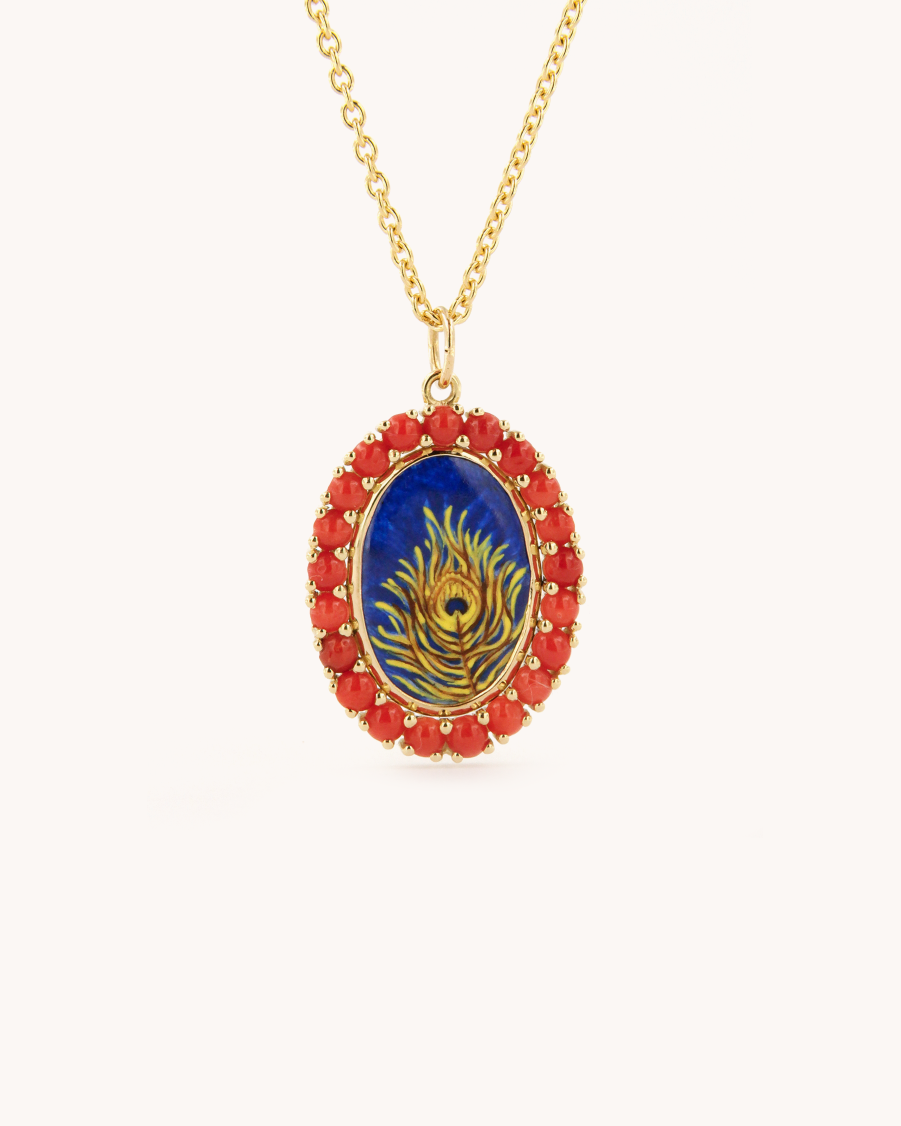 Ciondolo Piuma di Pavone con Corallo Rosso