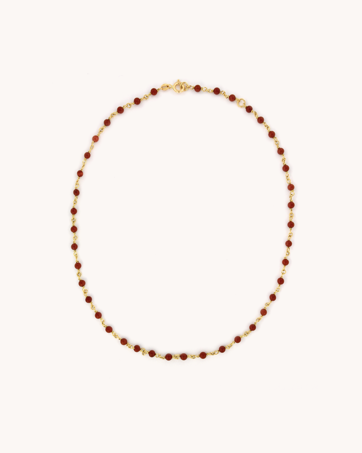 Collana Mediterraneo Base in oro giallo 18 carati, impreziosita da perline di diaspro.
