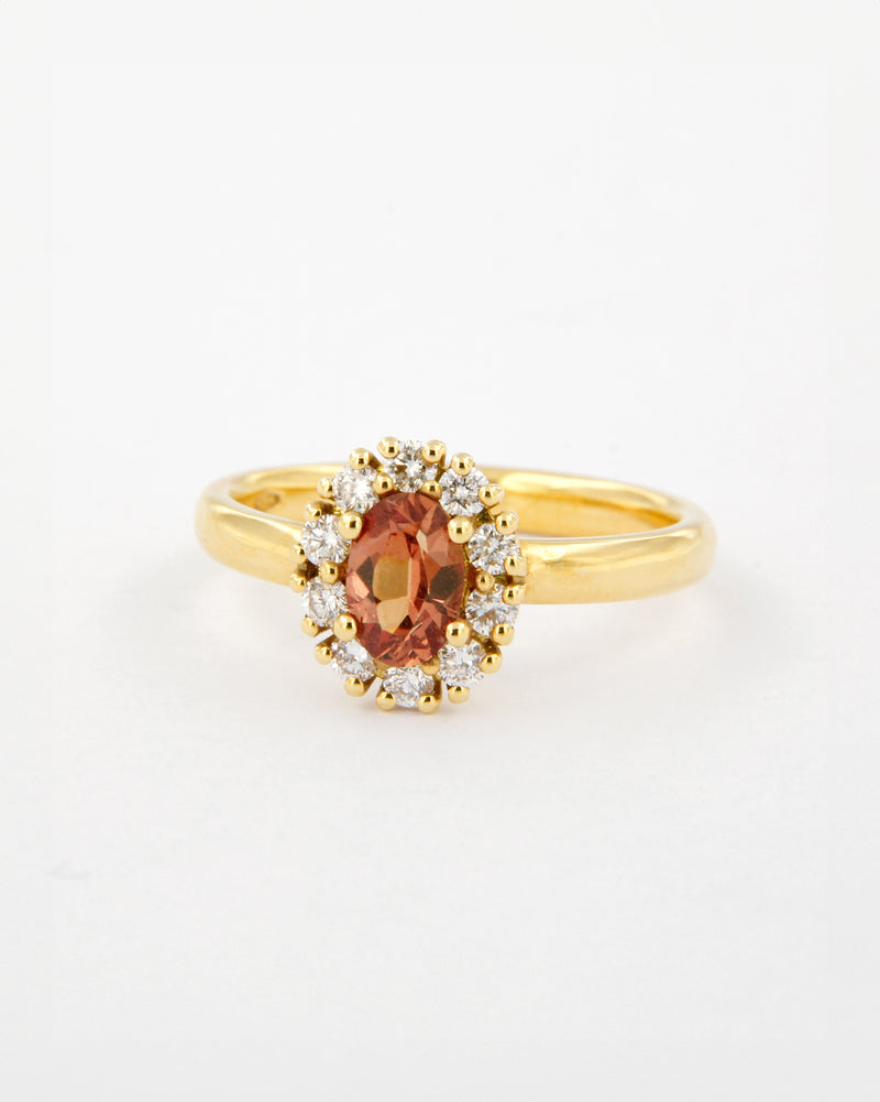 Orange Sapphire and Diamond Halo Ring