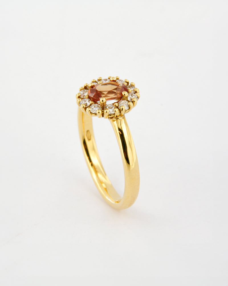 Orange Sapphire and Diamond Halo Ring