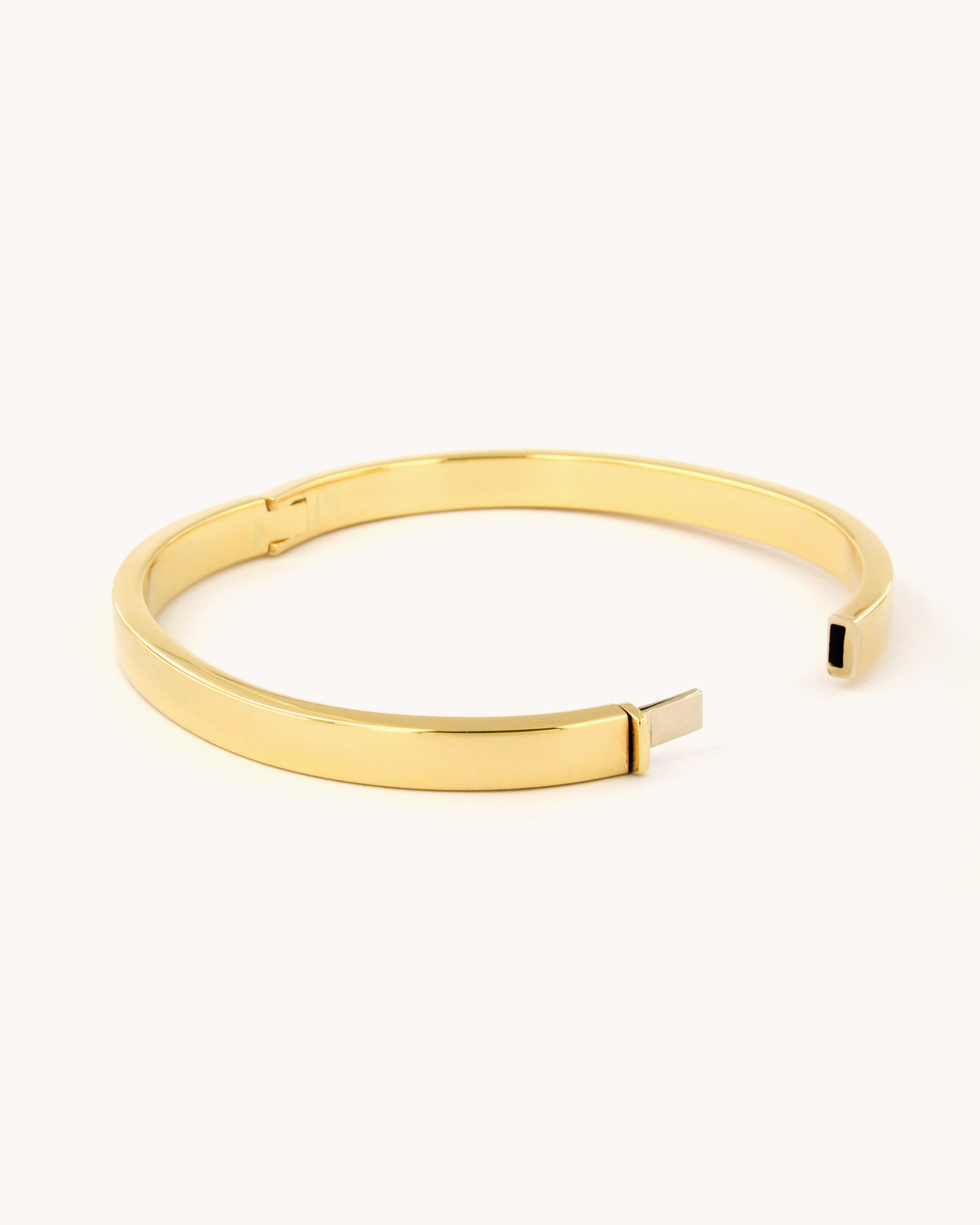 Bracciale rigido a fascia in oro giallo 18 carati