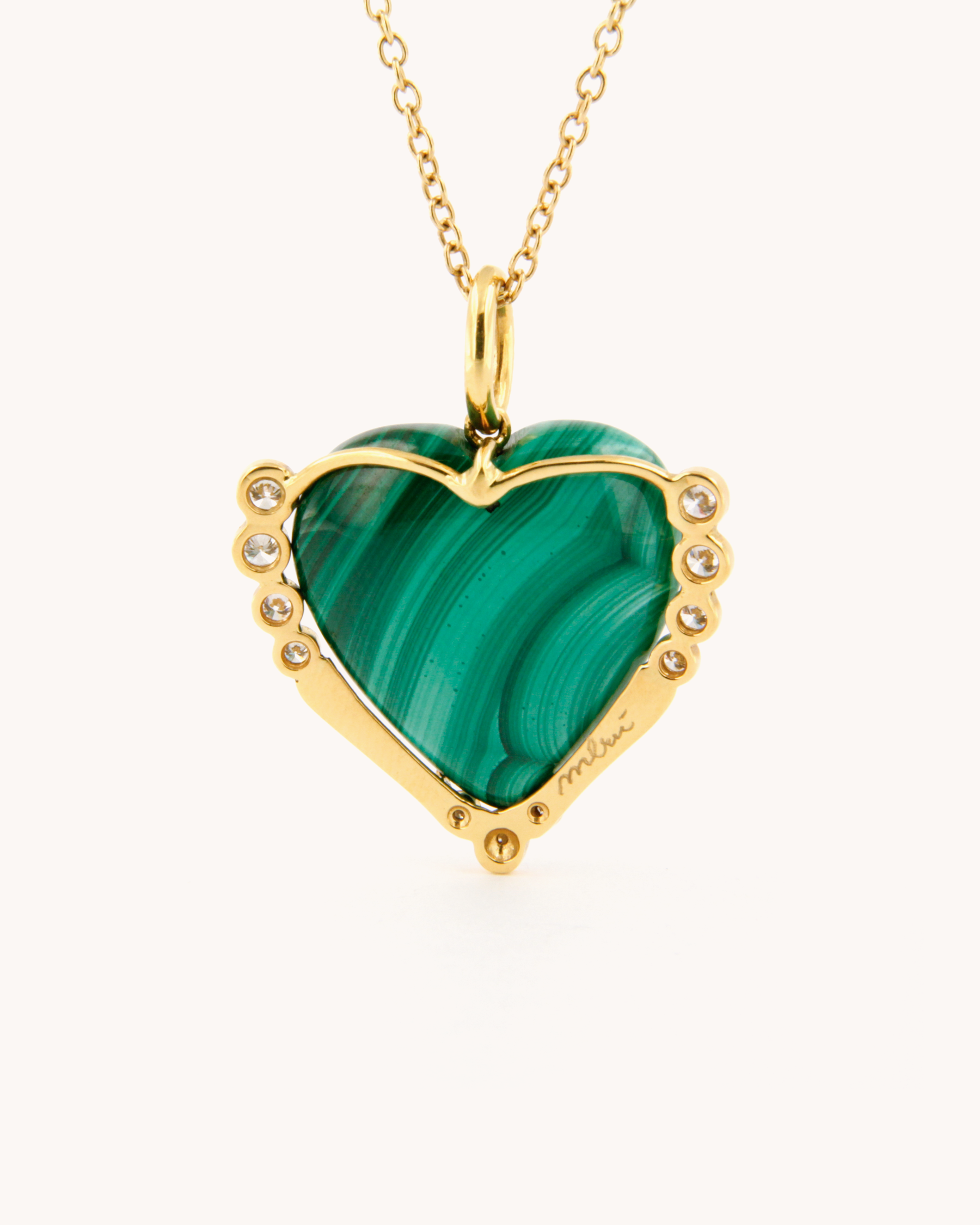 Ciondolo cuore in malachite naturale e diamanti in oro giallo 18K
