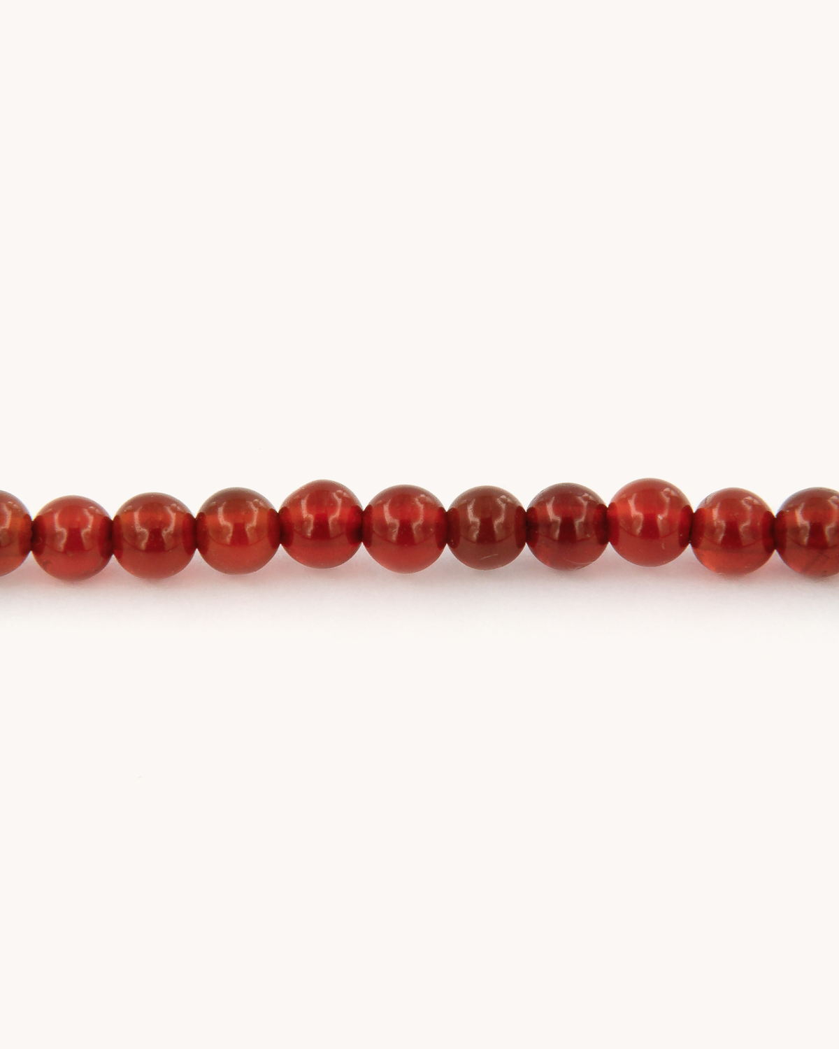Collana Coloris Mongolfiera nel Rosso Cremisi con perline di corniola e mongolfiera dipinta a mano in smalto a fuoco