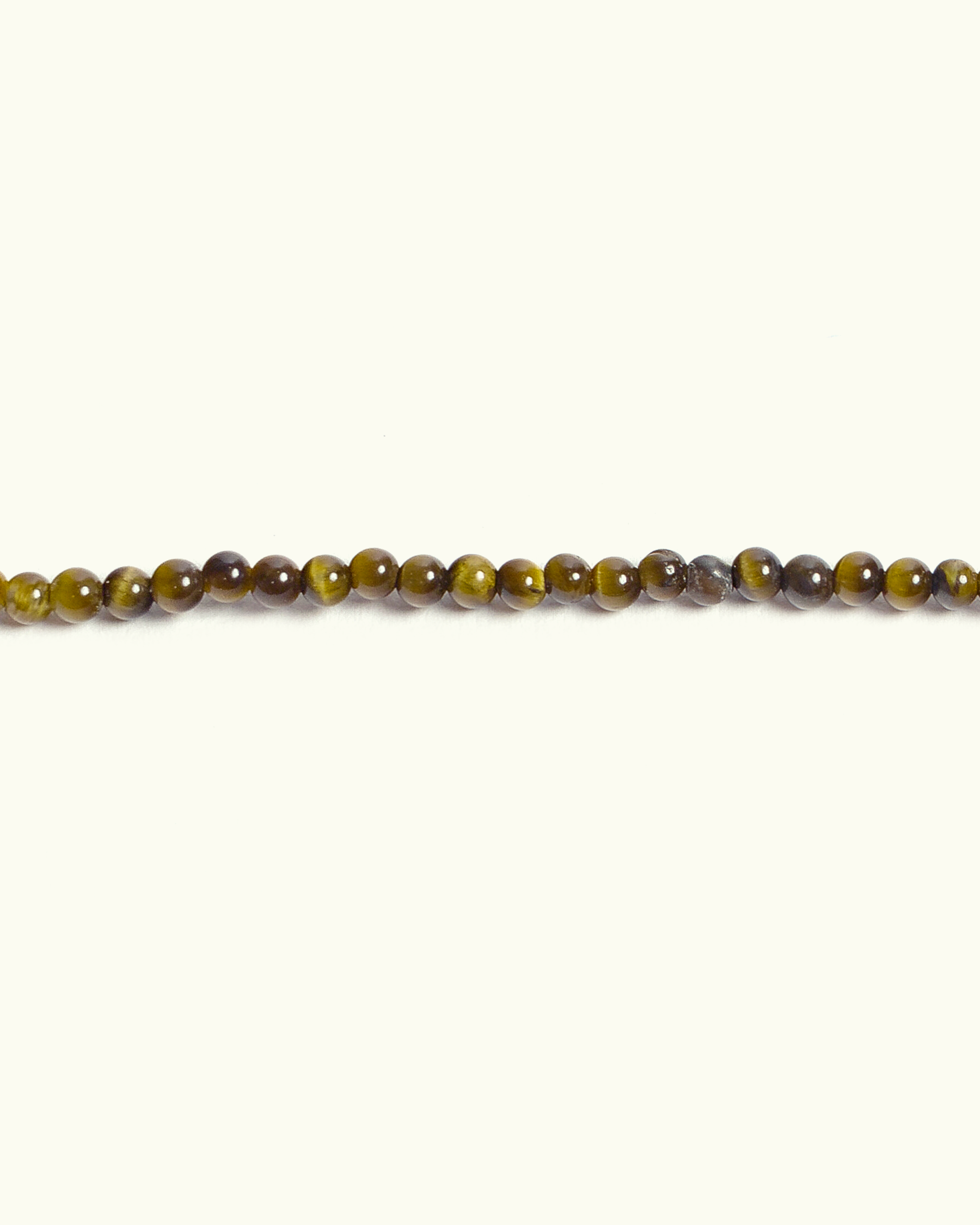Collana Coloris in occhio di tigre con piastra in oro giallo 18K e cuore dipinto a mano in smalto a fuoco