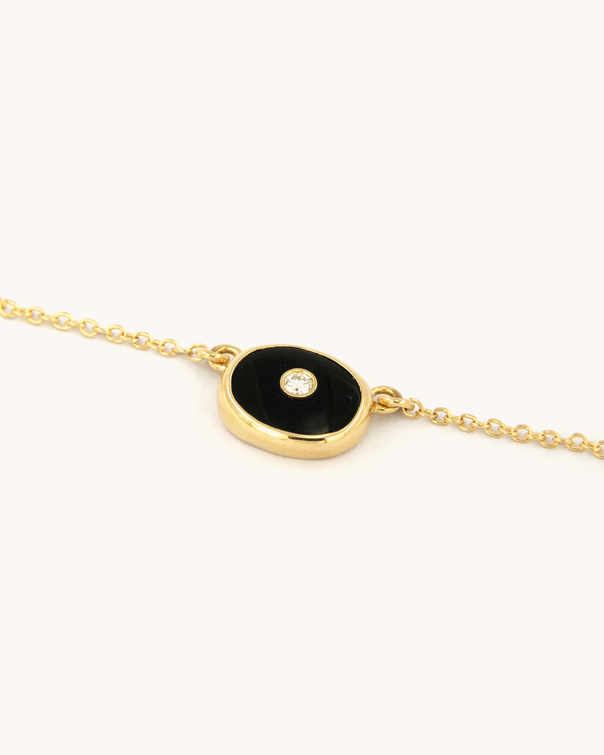 Collana in oro giallo 18 carati con onice e diamante