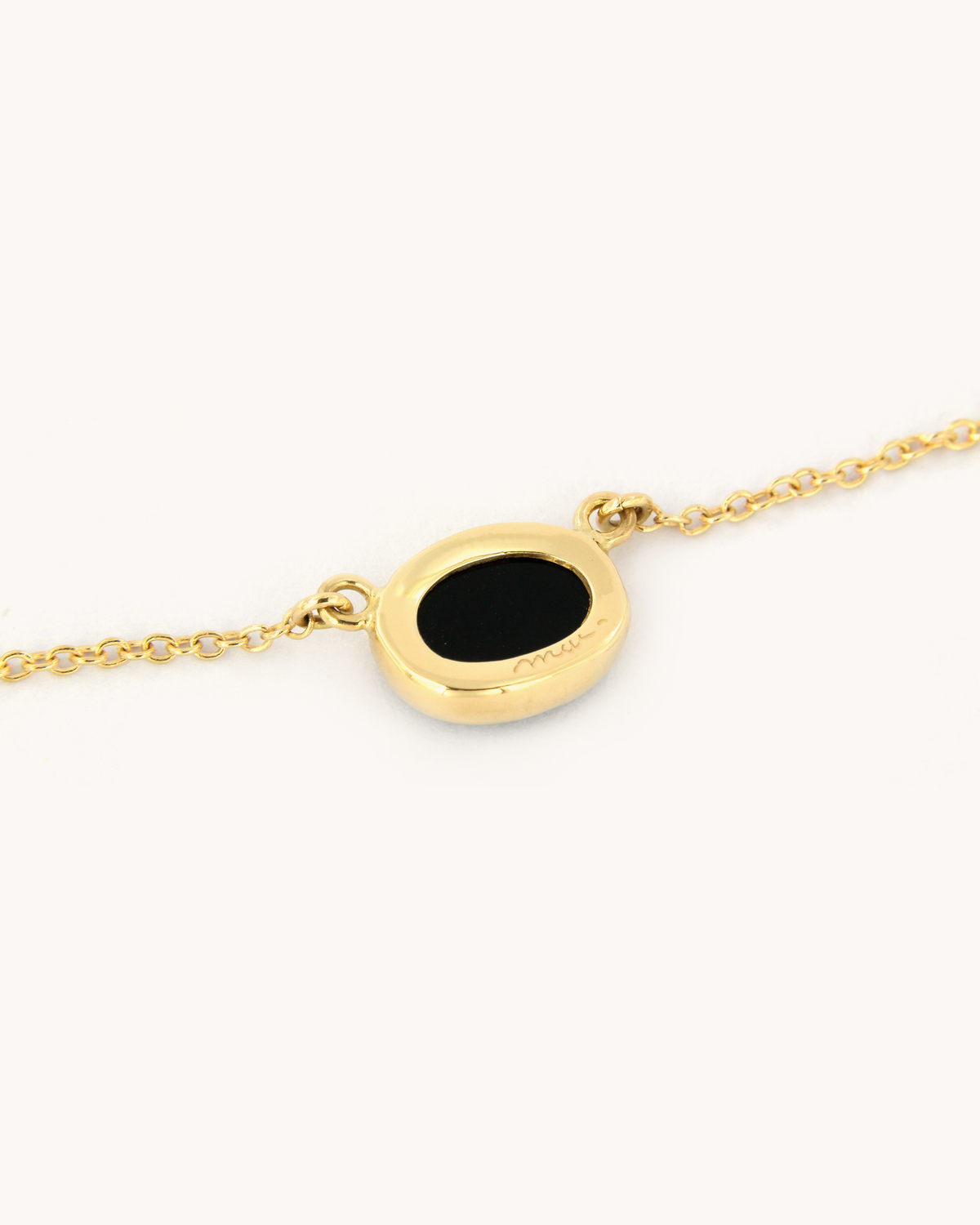 Collana in oro giallo 18 carati con onice e diamante