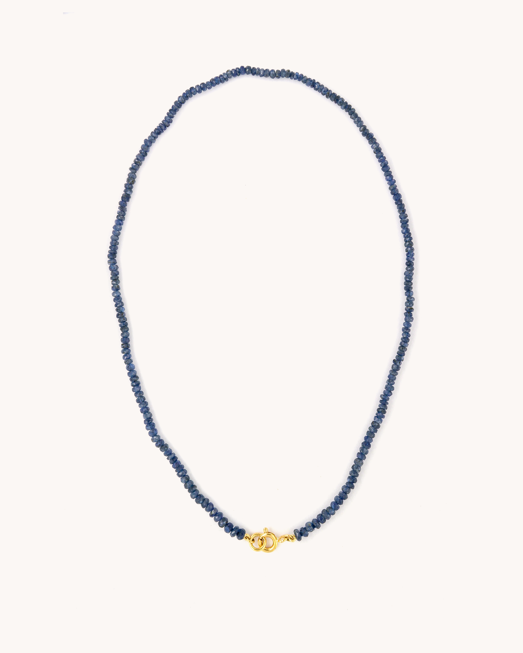 Collana in oro giallo 18 carati con perline di zaffiro blu