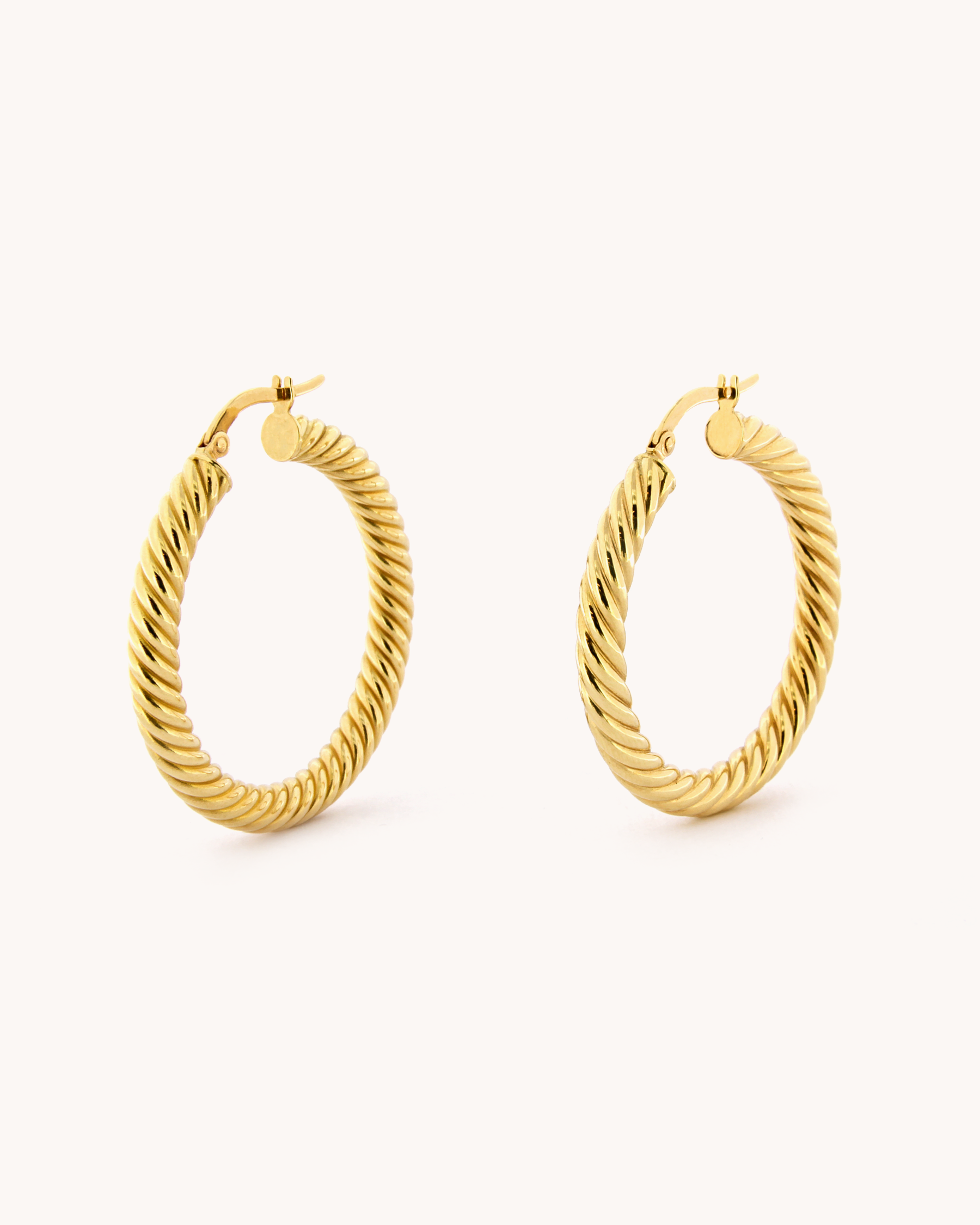 Orecchini a cerchio Torchon in oro giallo 18 carati con lavorazione a corda ritorta
